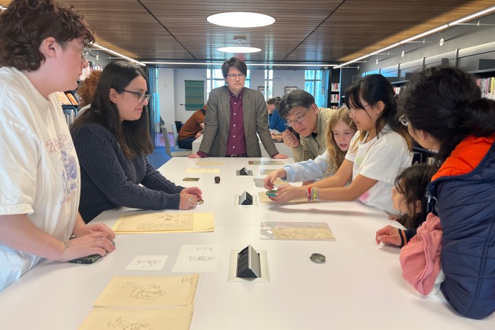 a group of people sitting at a table