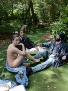 a group of people sitting at a park