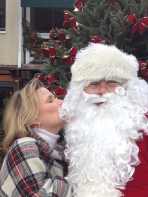 a woman holding a stuffed animal