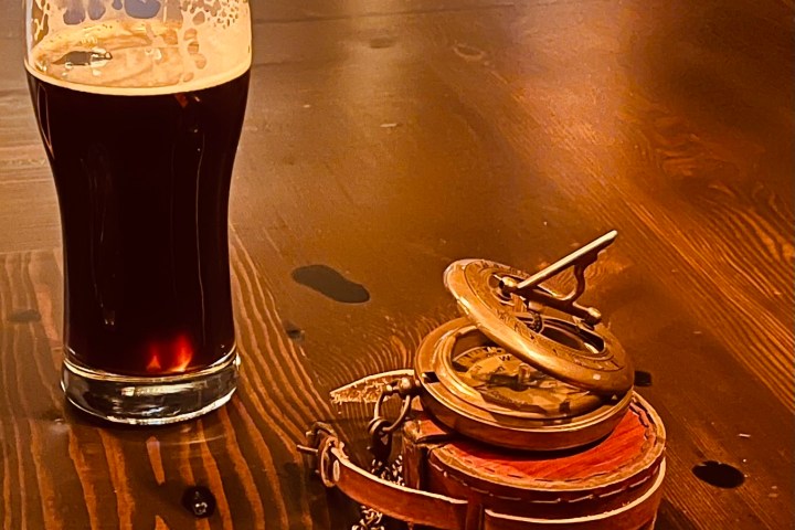 a glass of beer on a table