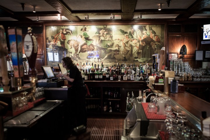 a group of people in a kitchen