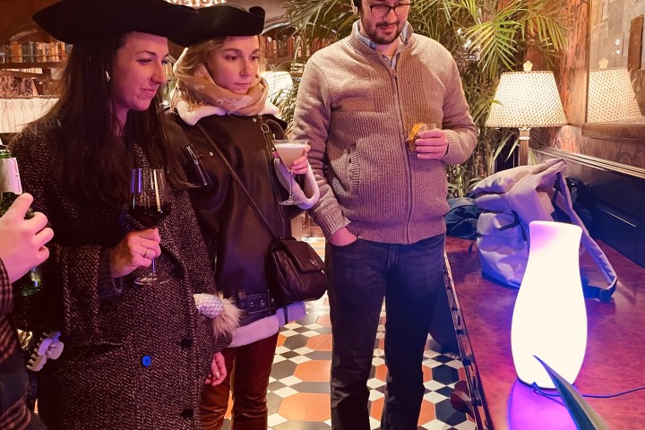 Monica Abbott et al. standing in a room