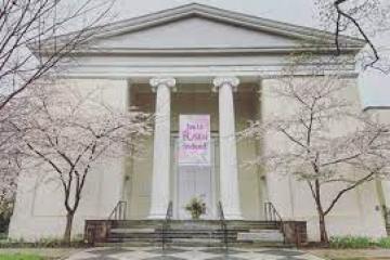 a house with trees in the background
