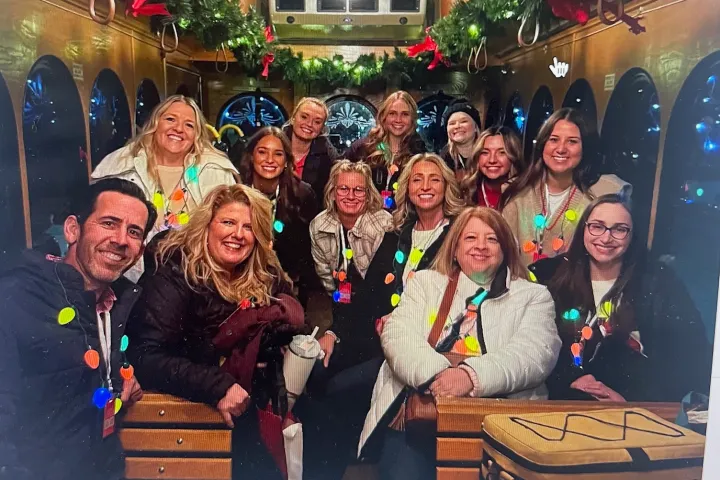 a group of people posing for a photo